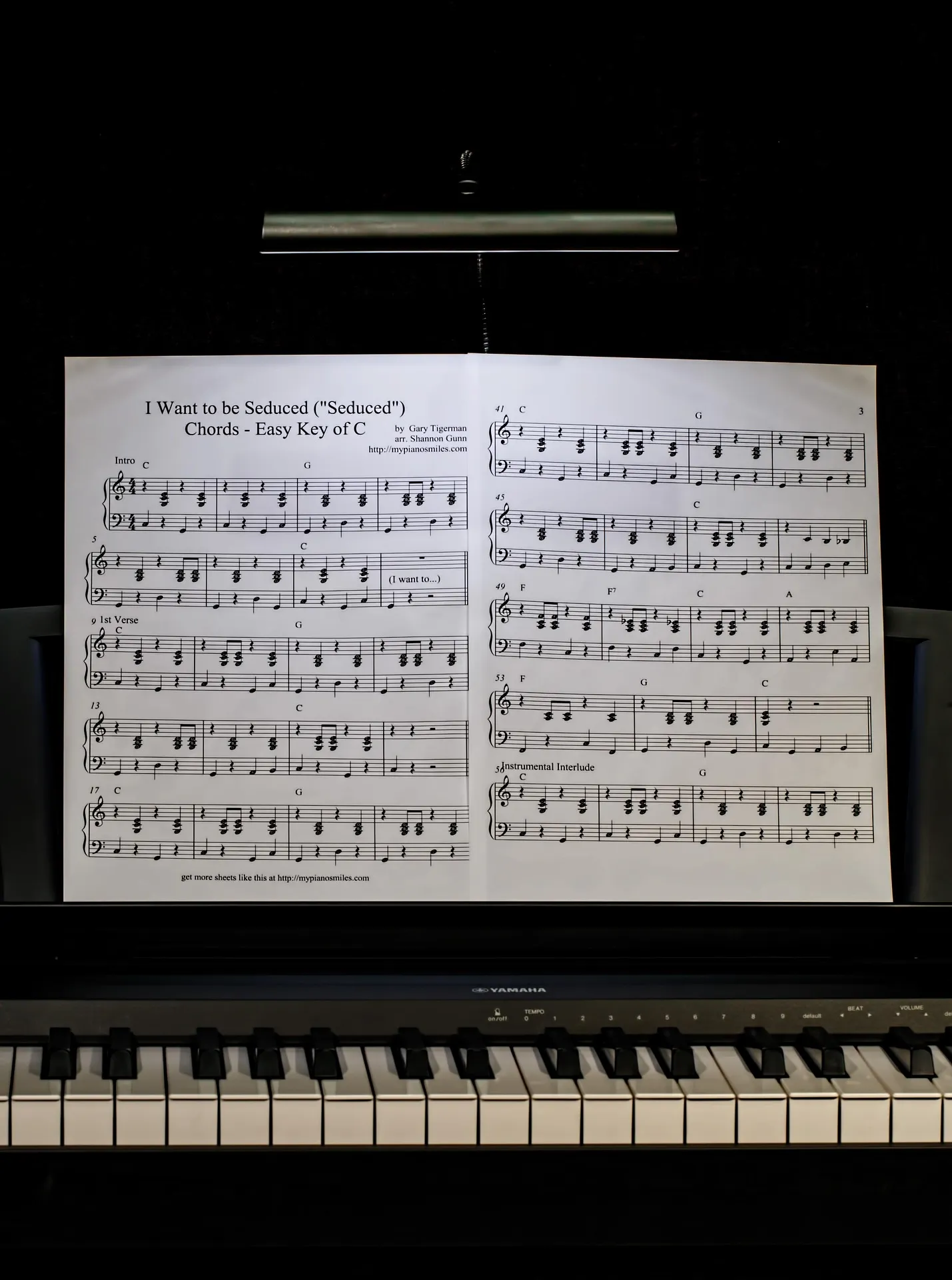 piano sheet music on keyboard used during practice to memorize music faster